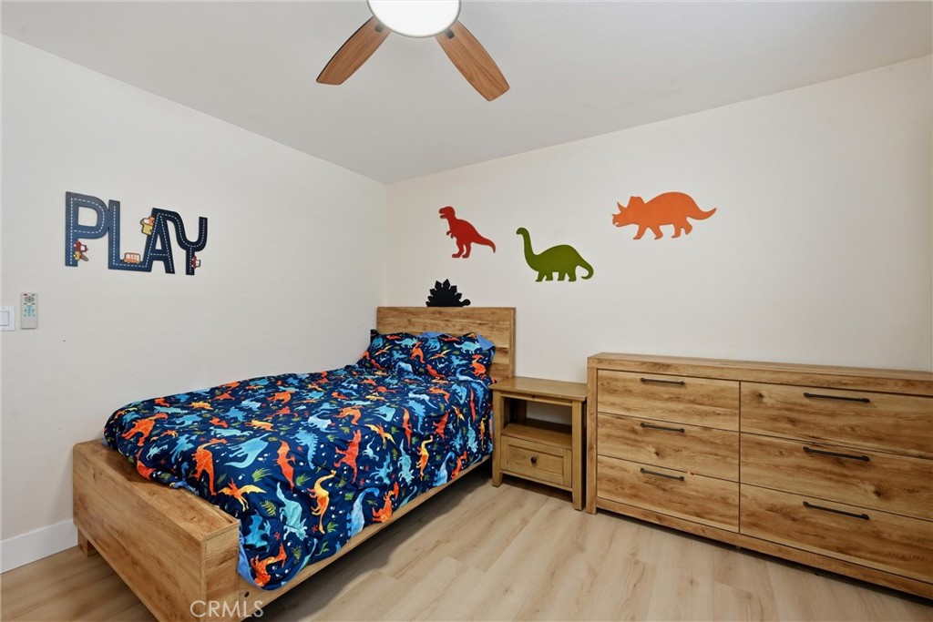16906 Greenridge Road Hidden Valley Lake, CA 95467 - Photo 13 of 24 a bedroom with a bed and a dresser