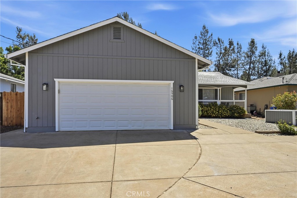 16906 Greenridge Road Hidden Valley Lake, CA 95467 - Photo 24 of 24 a front view of a house with a garage