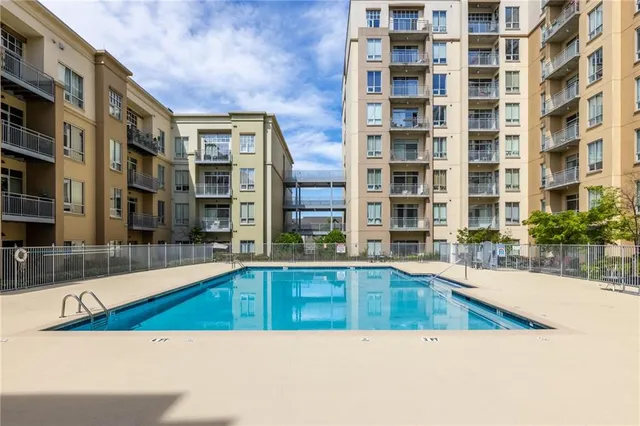 a view of an buildings with swimming pool