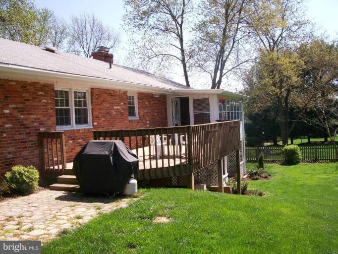 14608 Sturtevant Road Silver Spring, MD 20905 - Photo 13 of 27 a view of a house with backyard and a tree