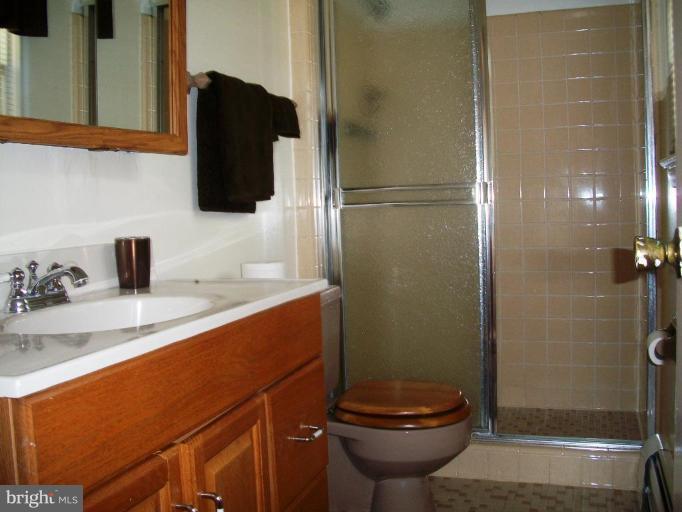 14608 Sturtevant Road Silver Spring, MD 20905 - Photo 16 of 27 a bathroom with a sink and a toilet