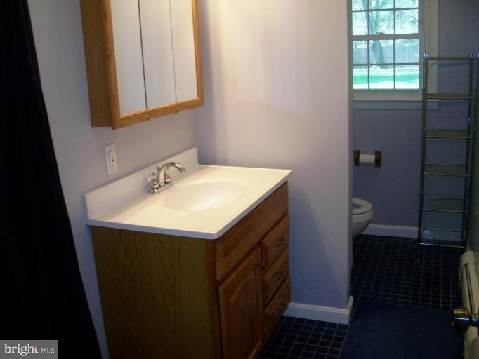 14608 Sturtevant Road Silver Spring, MD 20905 - Photo 20 of 27 a utility room with dryer and washer