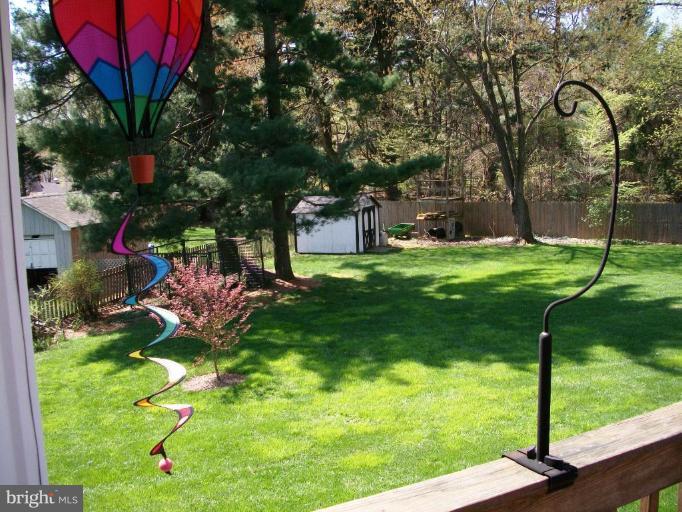 14608 Sturtevant Road Silver Spring, MD 20905 - Photo 9 of 27 a backyard of a house with lots of green space