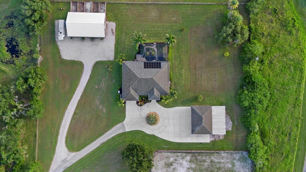 6816 Hawkins Road Sarasota, FL 34241 - Photo 2 of 60 an aerial view of a house with outdoor space
