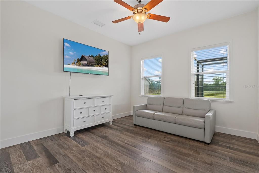 6816 Hawkins Road Sarasota, FL 34241 - Photo 22 of 60 a living room with furniture and a window