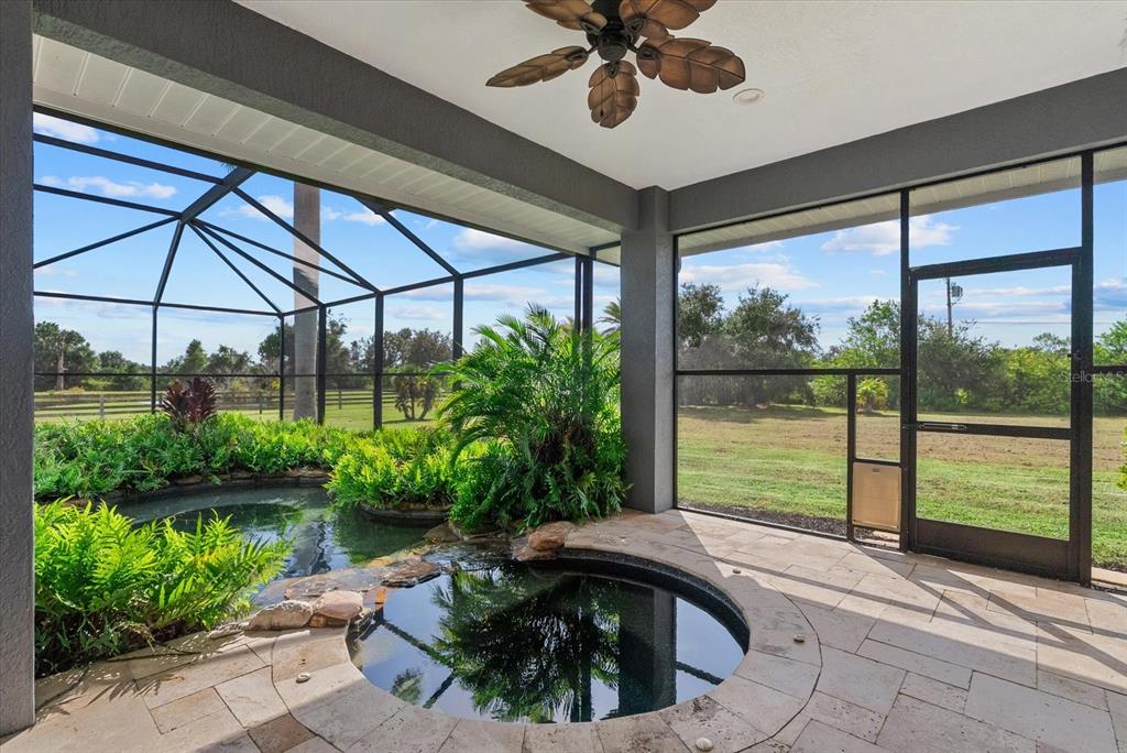6816 Hawkins Road Sarasota, FL 34241 - Photo 33 of 60 a view of a swimming pool with a patio