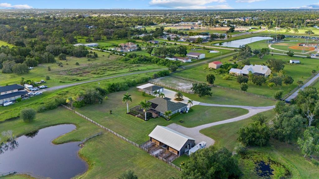 6816 Hawkins Road Sarasota, FL 34241 - Photo 54 of 60 an aerial view of a house with a yard