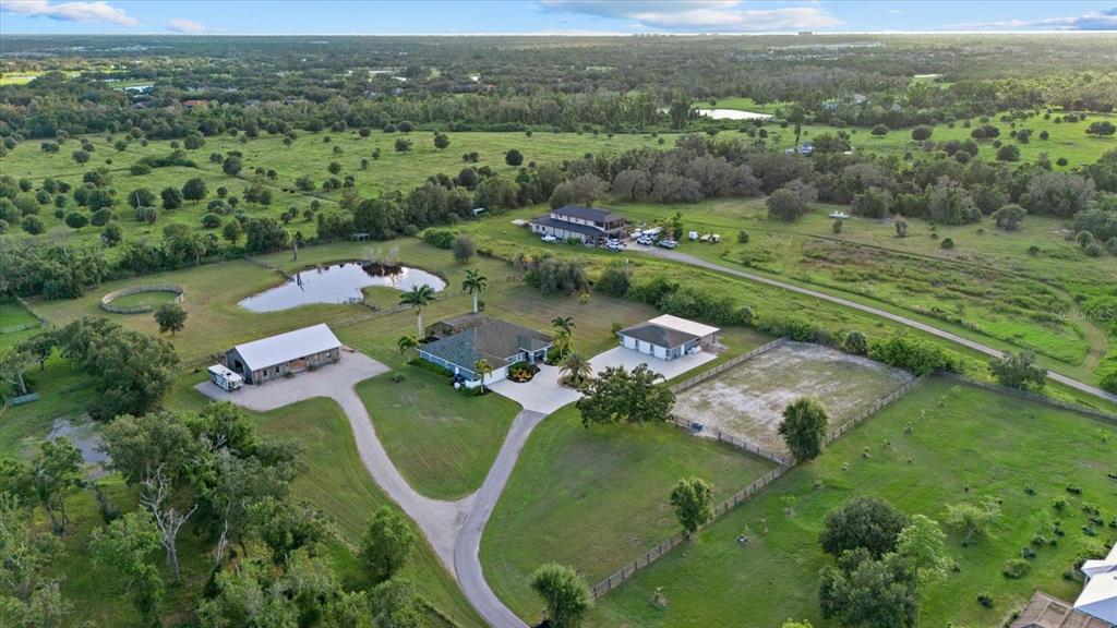 6816 Hawkins Road Sarasota, FL 34241 - Photo 55 of 60 an aerial view of a golf course with parking space
