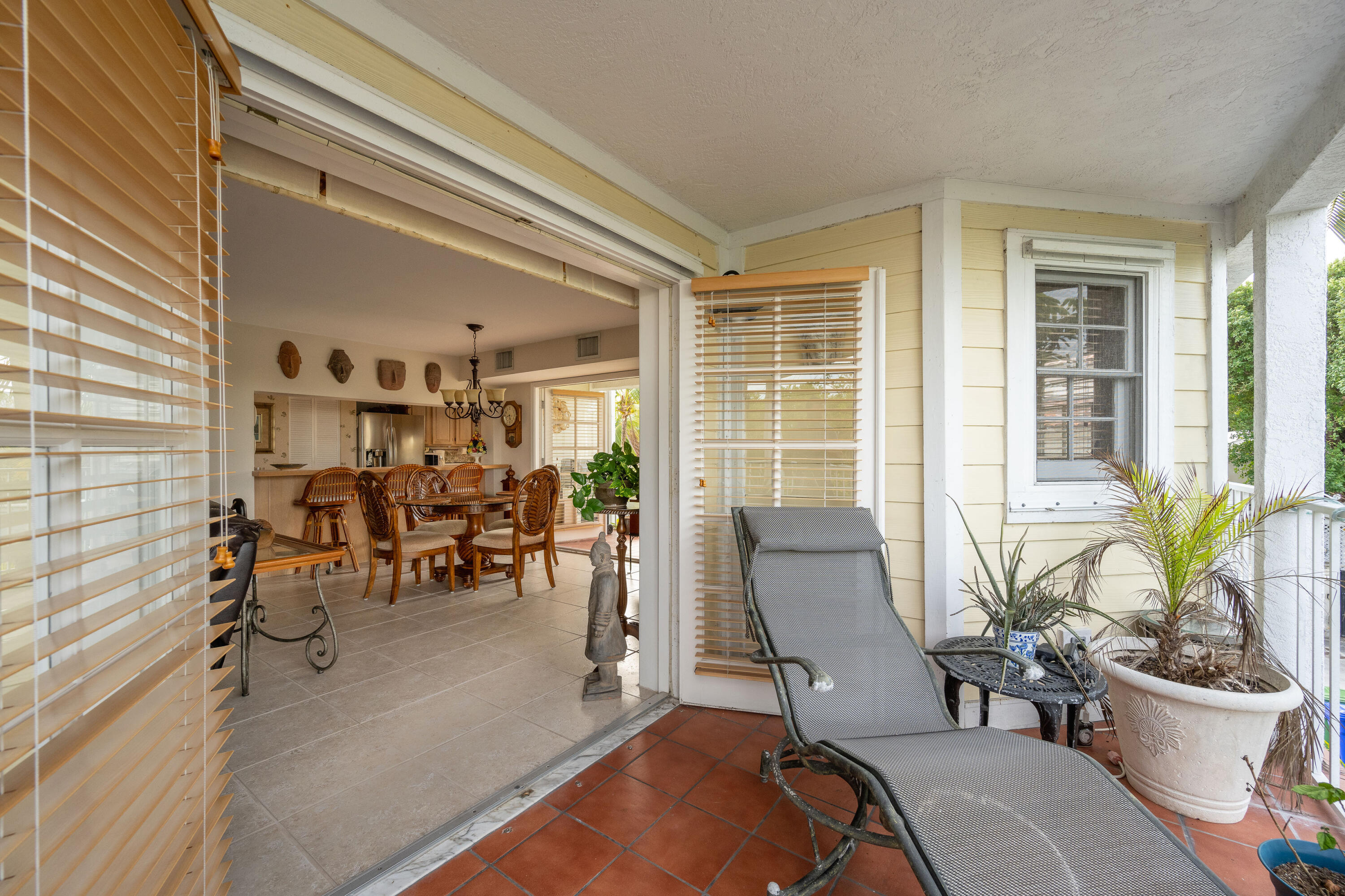 30 Hilton Haven Road, Unit 2A Key West, FL 33040 - Photo 15 of 42 a living room filled with furniture and a potted plant