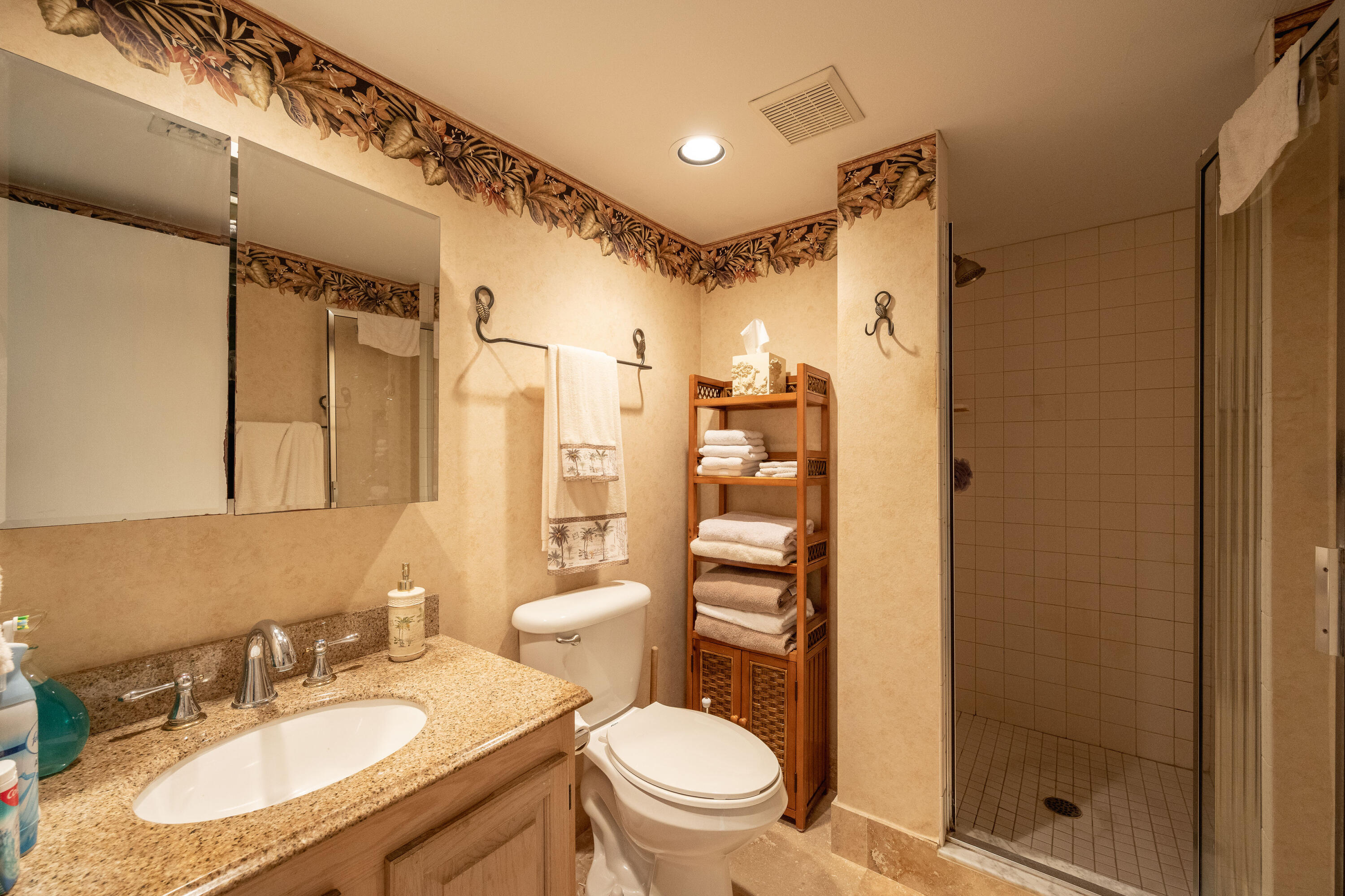 30 Hilton Haven Road, Unit 2A Key West, FL 33040 - Photo 21 of 42 a bathroom with a granite countertop sink toilet and shower