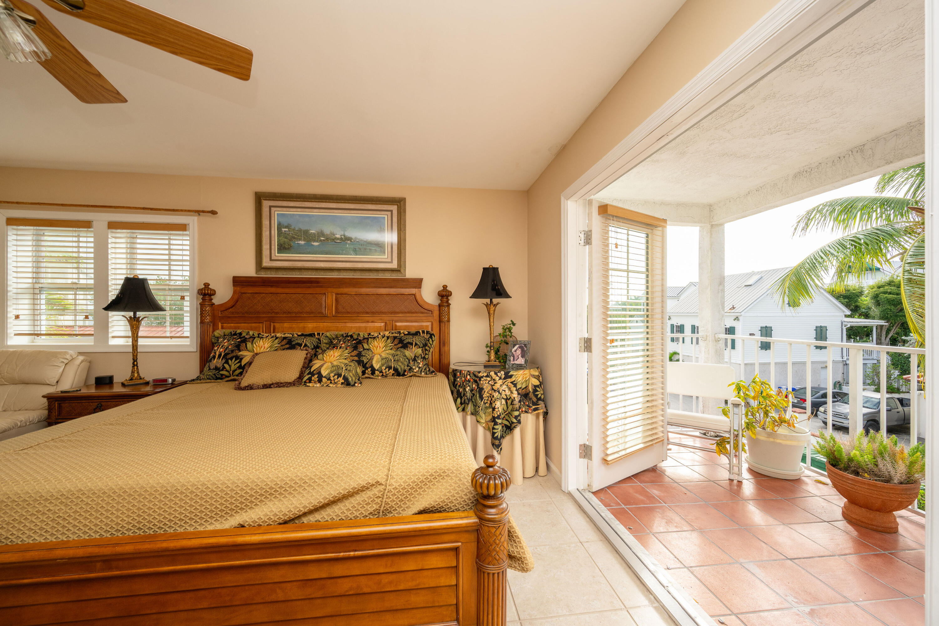 30 Hilton Haven Road, Unit 2A Key West, FL 33040 - Photo 25 of 42 a bedroom with furniture and a large window