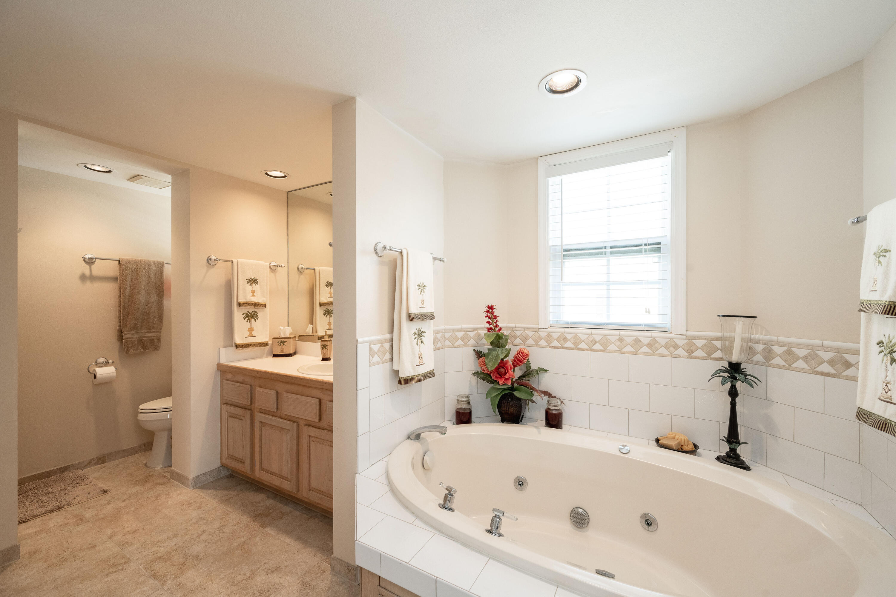 30 Hilton Haven Road, Unit 2A Key West, FL 33040 - Photo 29 of 42 a white bath tub sitting next to a white sink