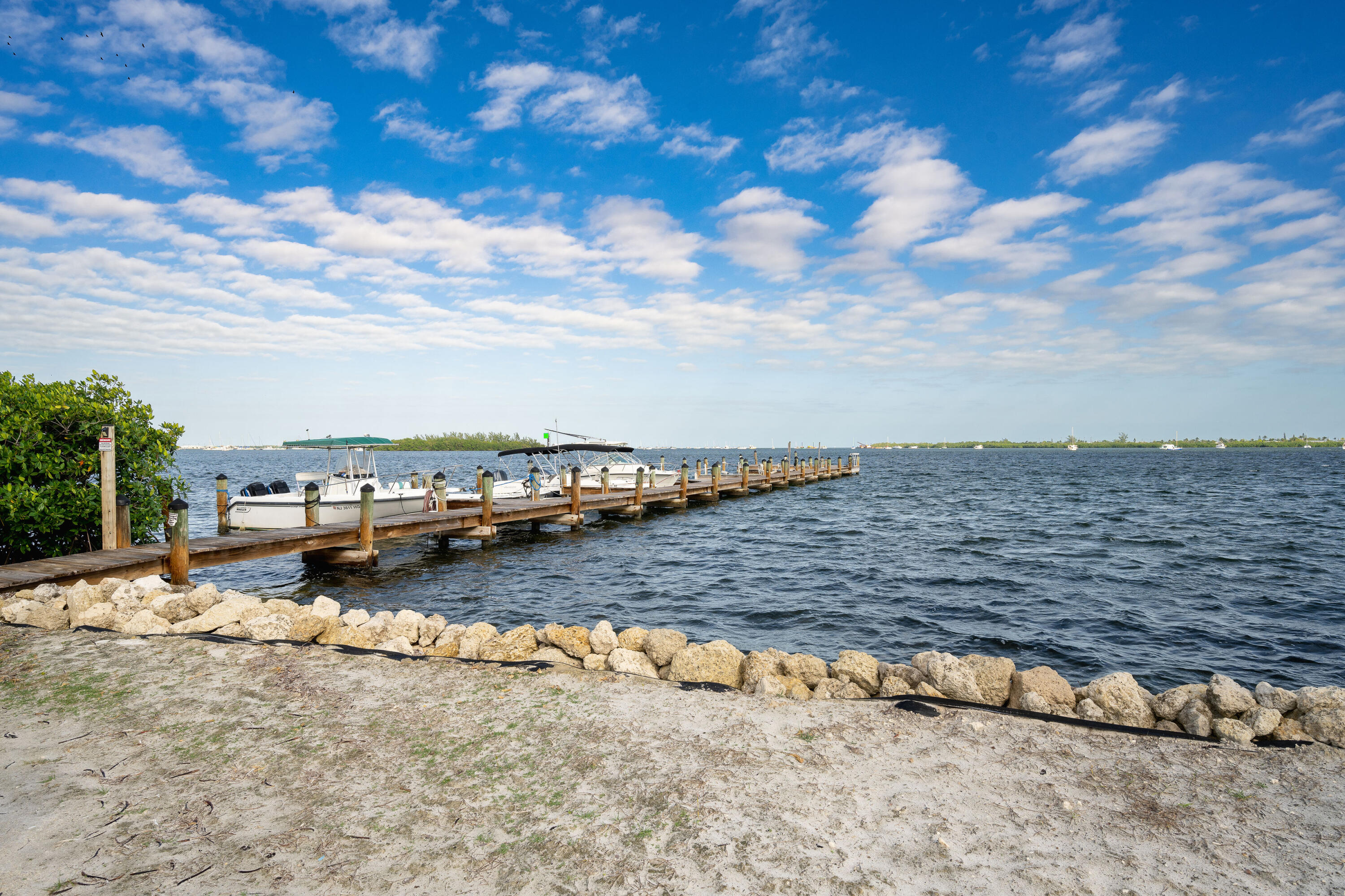 30 Hilton Haven Road, Unit 2A Key West, FL 33040 - Photo 39 of 42 a view of a large body of water with a building in the background