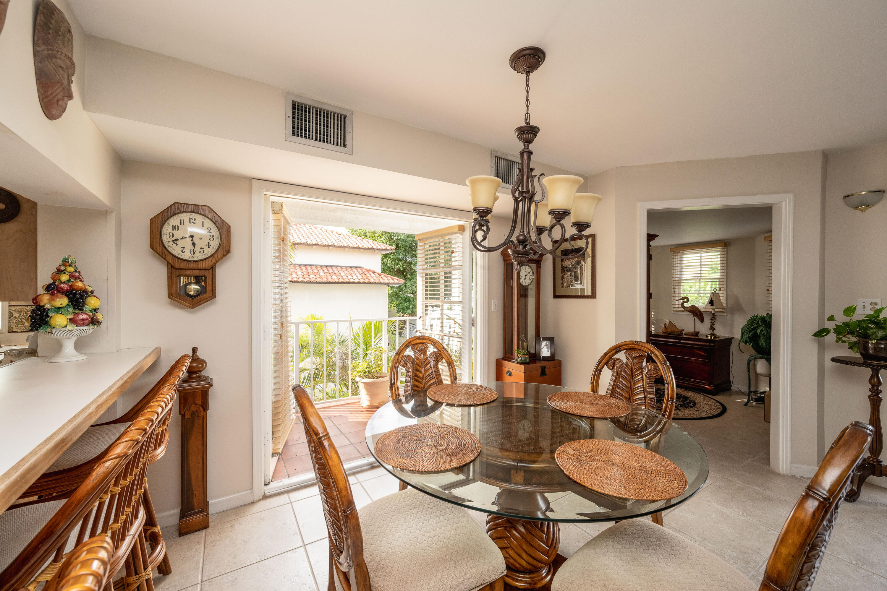 30 Hilton Haven Road, Unit 2A Key West, FL 33040 - Photo 5 of 42 a dining room with furniture and window