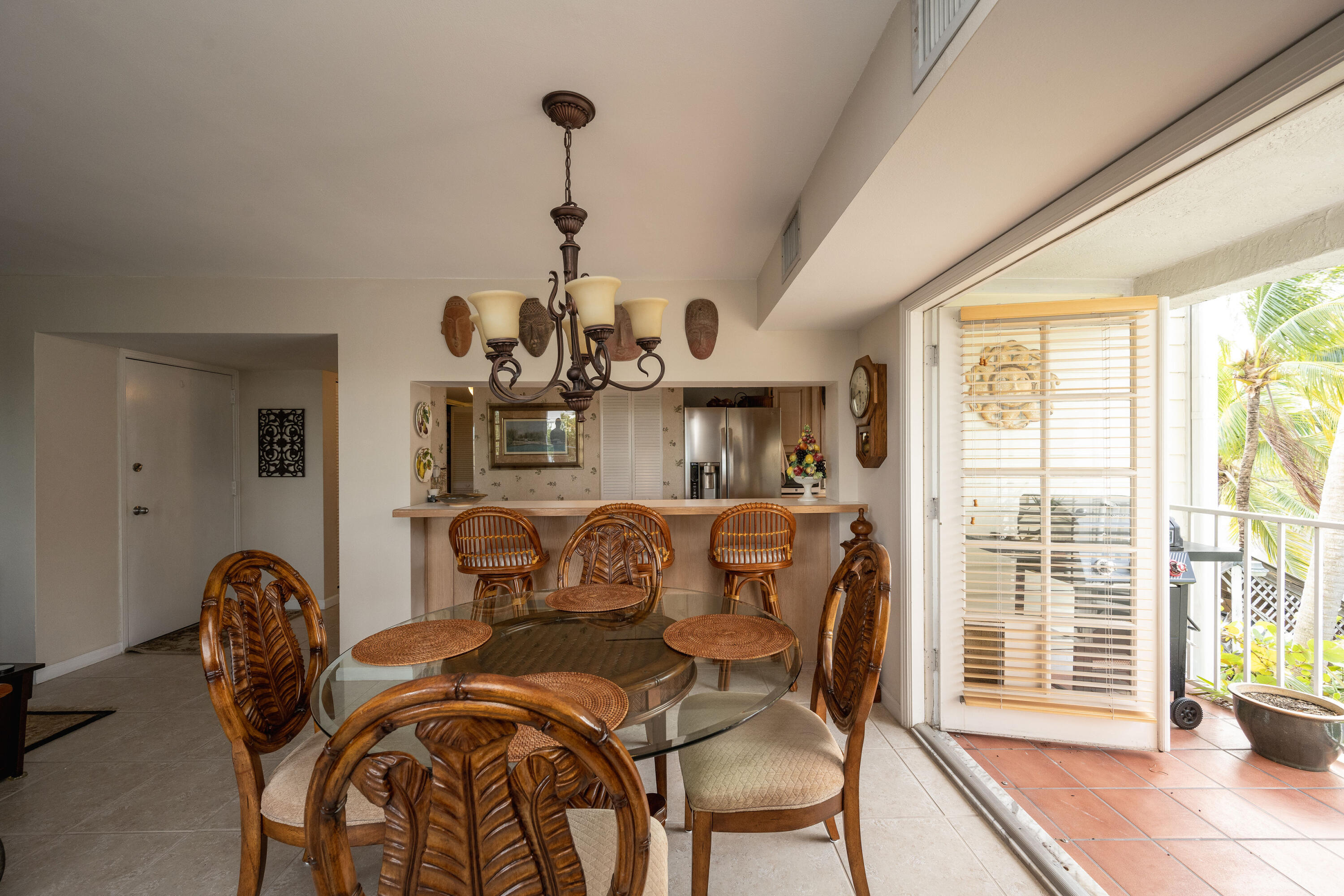 30 Hilton Haven Road, Unit 2A Key West, FL 33040 - Photo 9 of 42 a dining room with furniture and windows