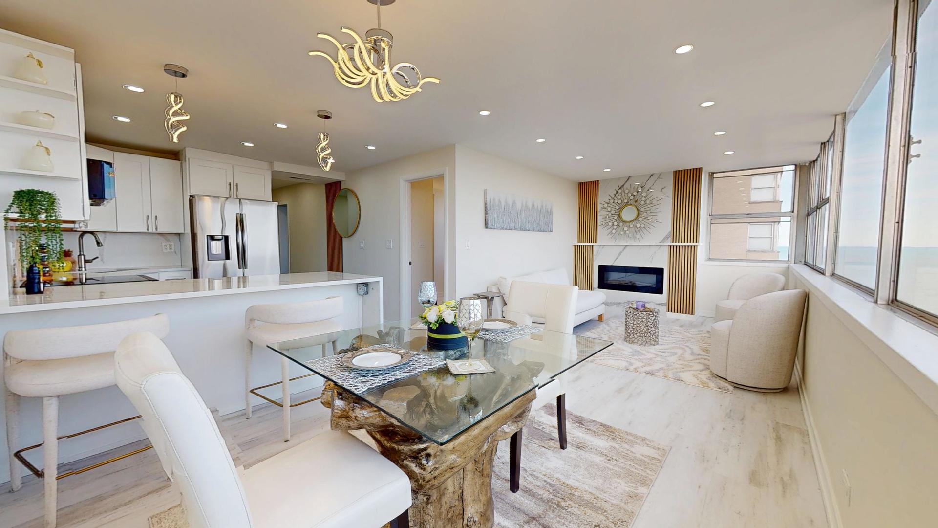 6301 North Sheridan Road, Unit 17G Chicago, IL 60660 - Photo 4 of 14 a view of a dining room with furniture