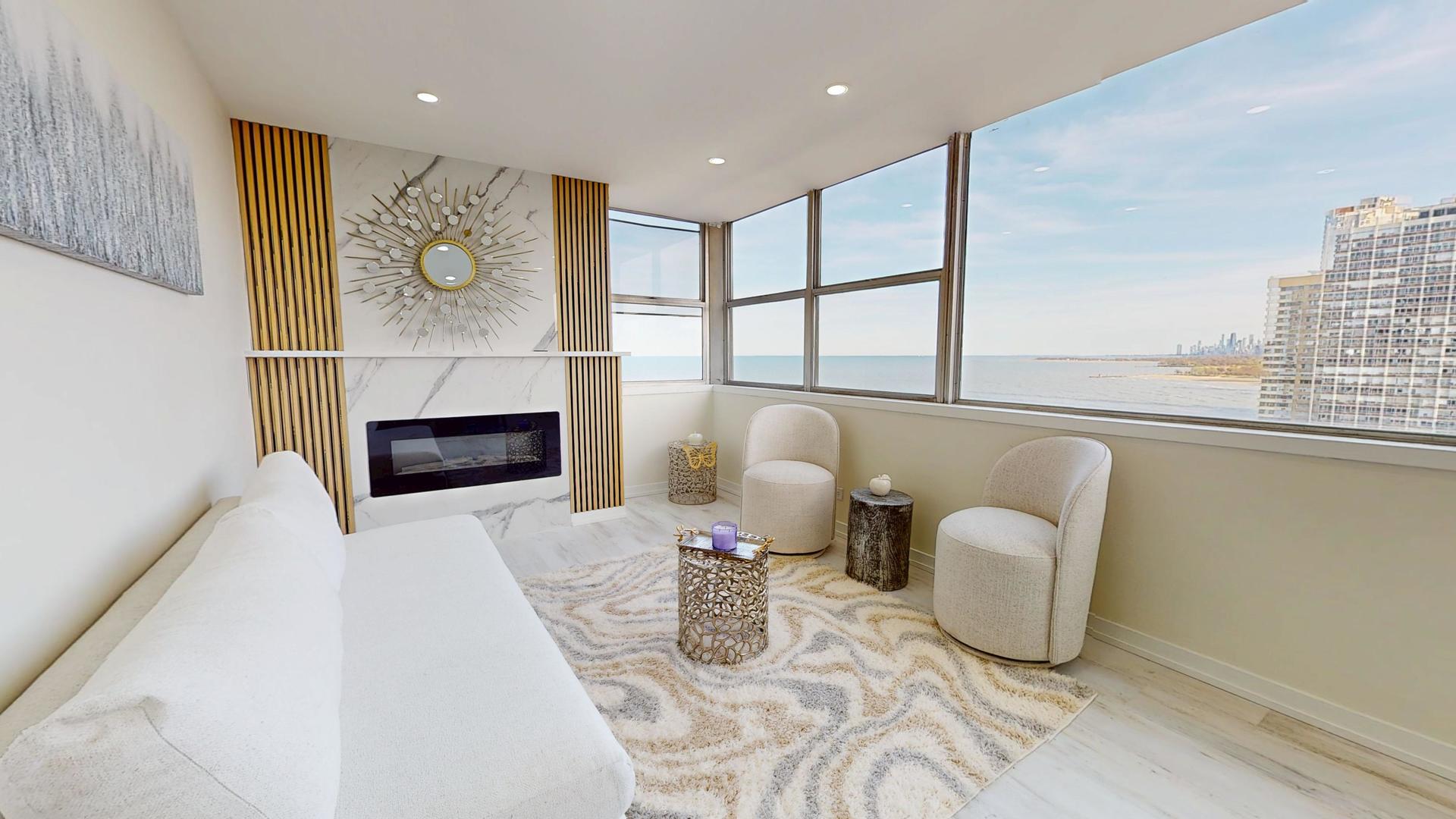 6301 North Sheridan Road, Unit 17G Chicago, IL 60660 - Photo 6 of 14 a bathroom with a sink mirror and window