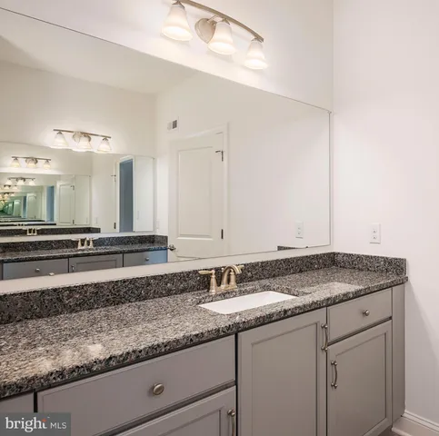 a bathroom with a shower and toilet