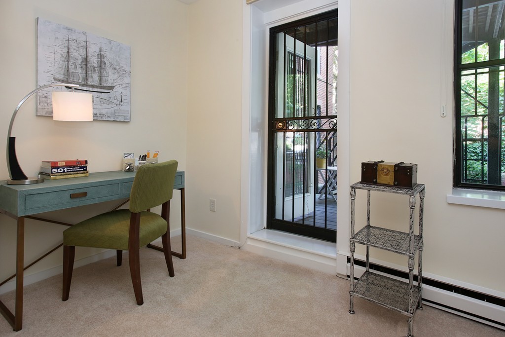 75 Waltham Street, Unit 2 Boston, MA 02118 - Photo 4 of 8 a workspace with furniture and window