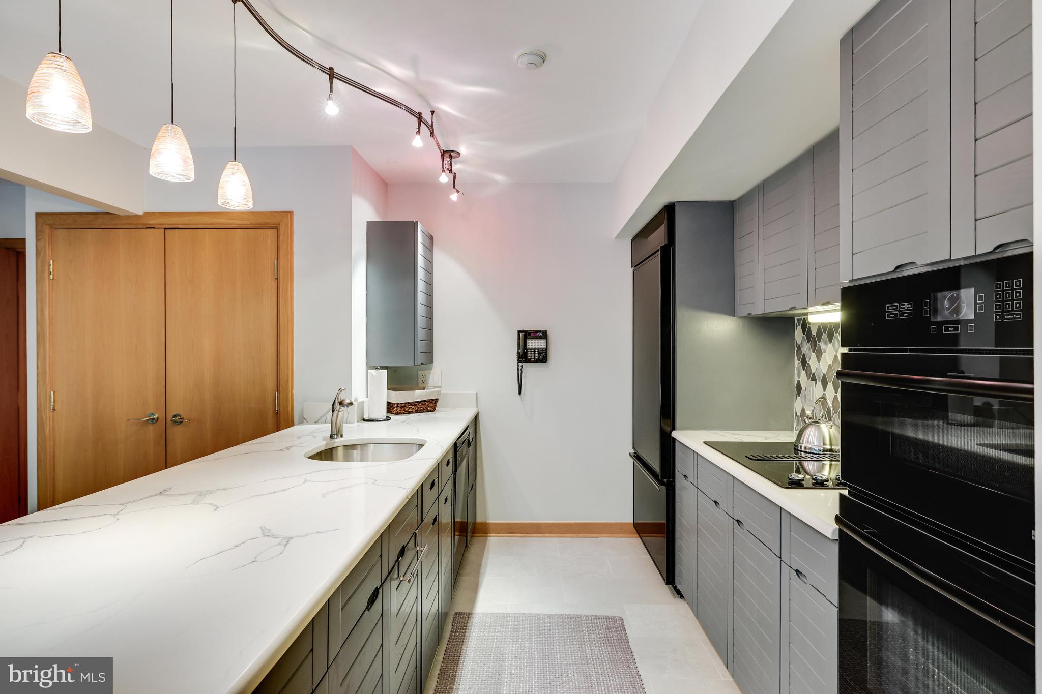 2202 Spinnaker Court Reston, VA 20191 - Photo 63 of 137 Quartz counters & ceramic tiled floors.