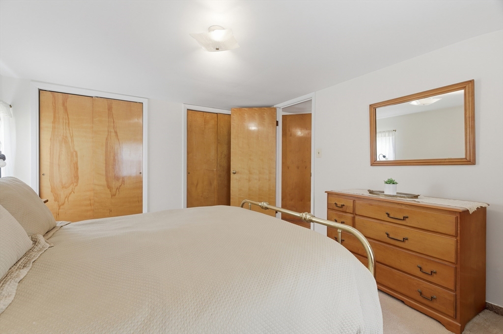 188 Glendale Road Attleboro, MA 02703 - Photo 18 of 37 a bedroom with a bed and a dresser