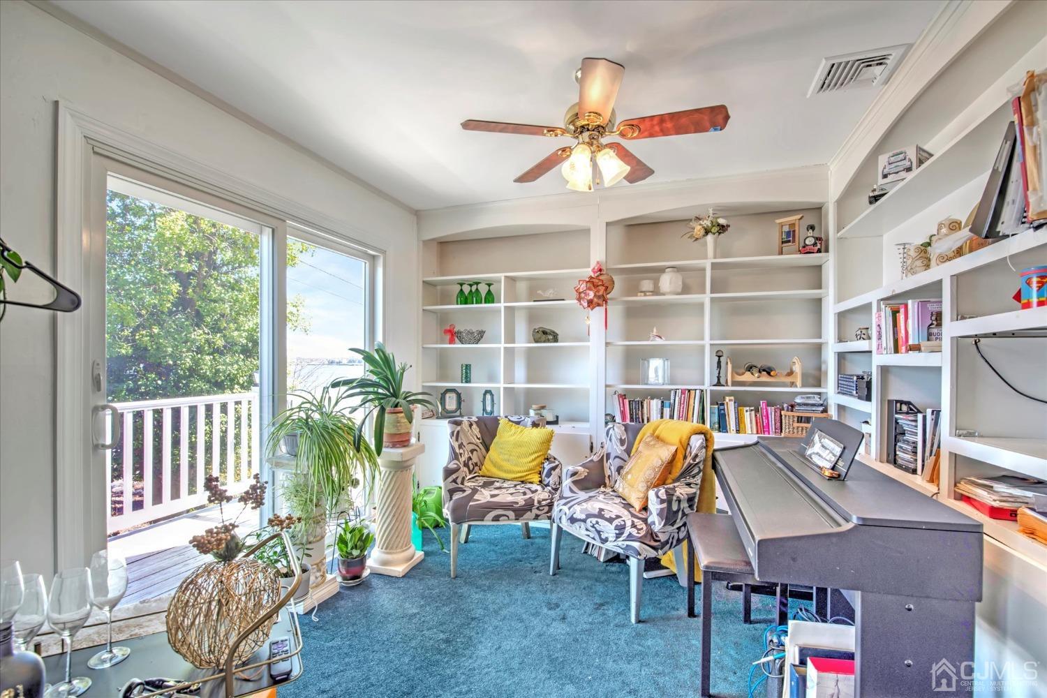 315 Beach Drive Keyport, NJ 07735 - Photo 13 of 40 a view of a workspace with furniture and a potted plant