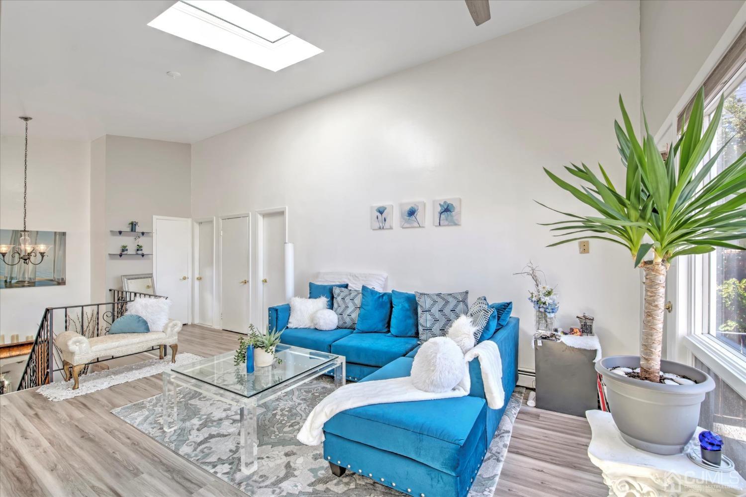 315 Beach Drive Keyport, NJ 07735 - Photo 26 of 40 a living room with furniture and a potted plant