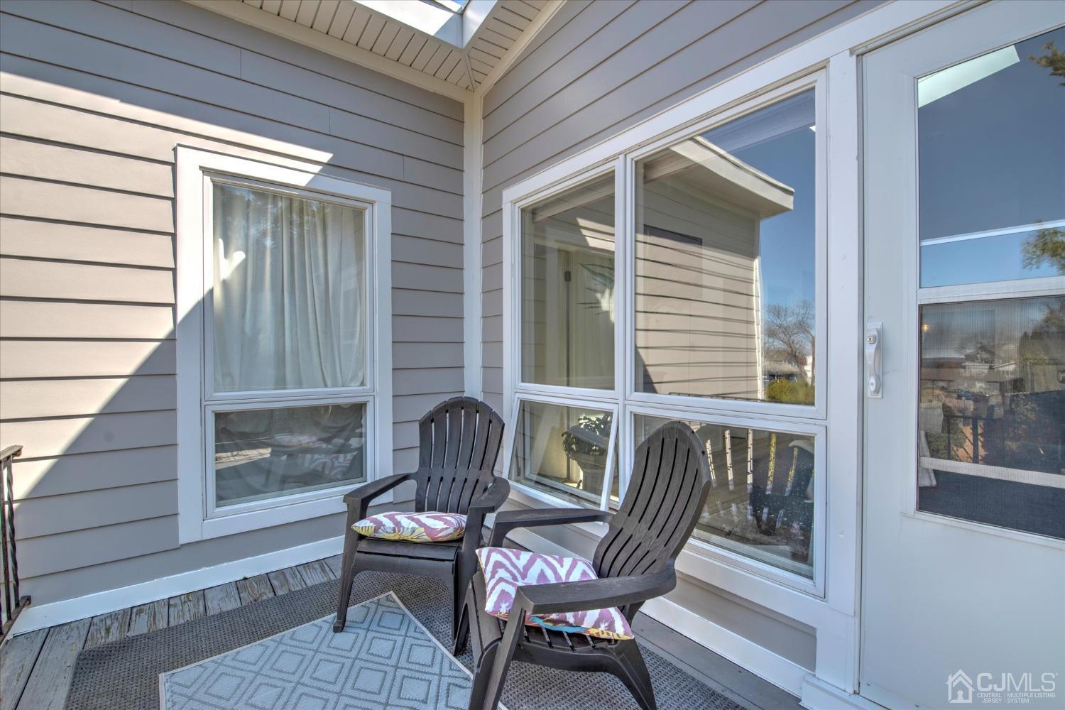 315 Beach Drive Keyport, NJ 07735 - Photo 36 of 40 a wooden bench sitting in front of a building