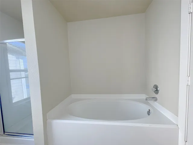 a bathroom with a bathtub