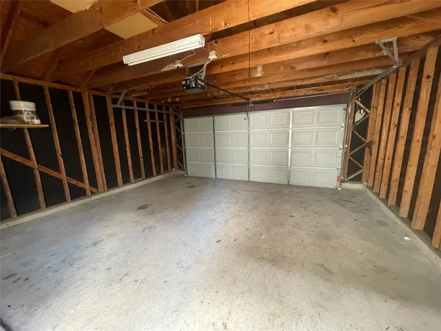 a view of a garage of wooden wall