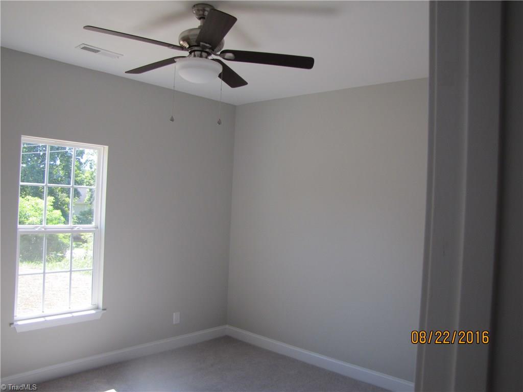 3609 Ruby Road Winston-Salem, NC 27106 - Photo 14 of 27 2nd BR. The second and third bedrooms have double door closets. There is a coat closet & linen closet in this hall between the two bedrooms with the hall bathroom.