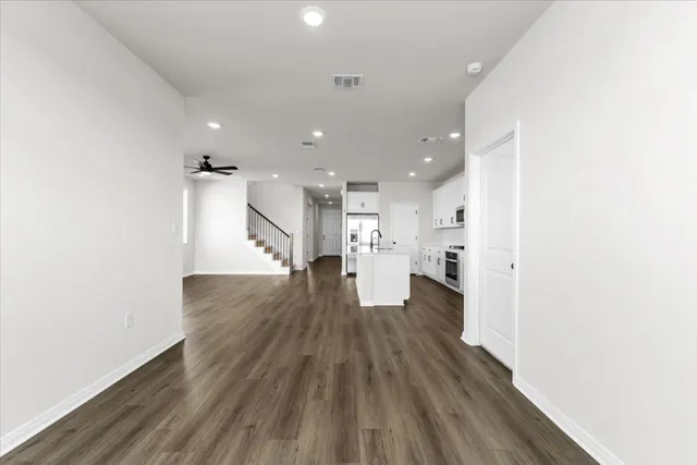 a view of kitchen with wooden floor