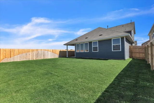 a view of a backyard with a garden