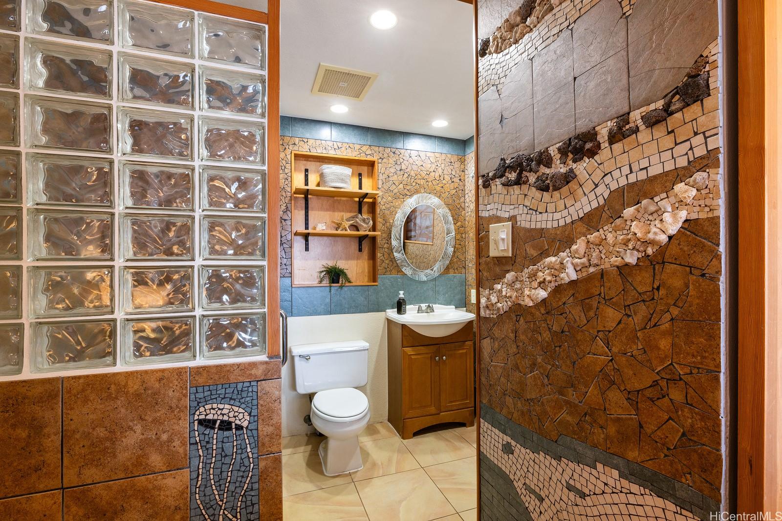 92-905 Hame Place, Unit 19203 Kapolei, HI 96707 - Photo 13 of 23 a bathroom with a toilet and a shower