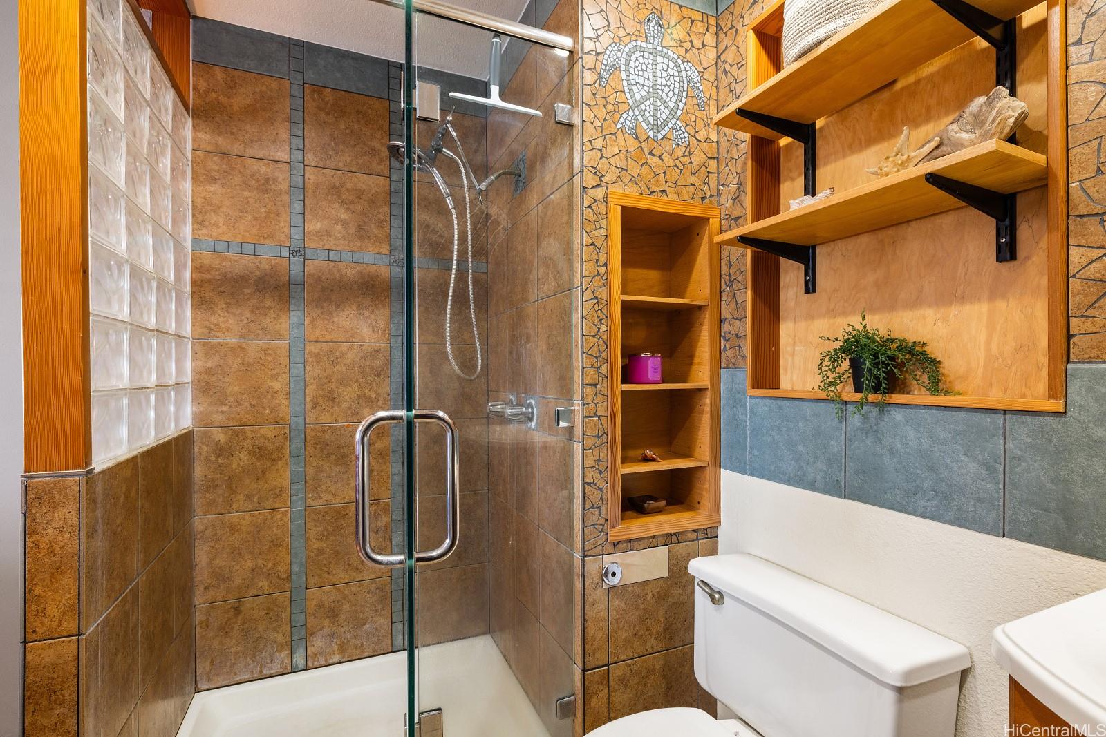 92-905 Hame Place, Unit 19203 Kapolei, HI 96707 - Photo 15 of 23 a bathroom with a shower and a sink