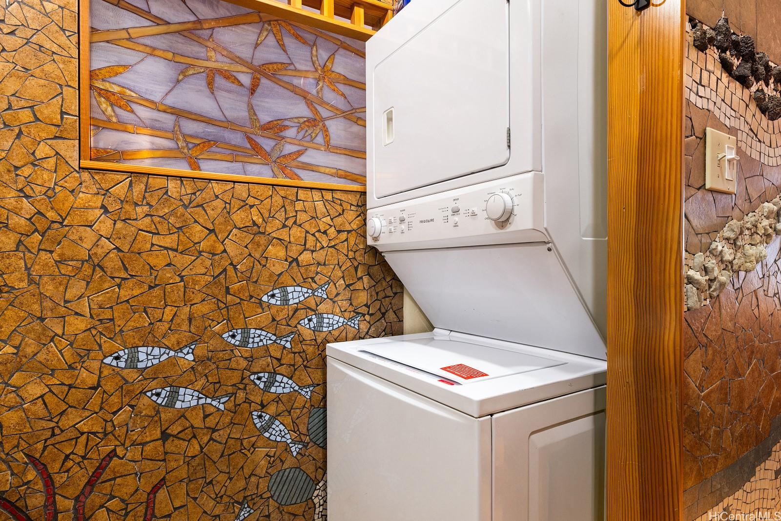 92-905 Hame Place, Unit 19203 Kapolei, HI 96707 - Photo 16 of 23 a utility room with dryer and washer