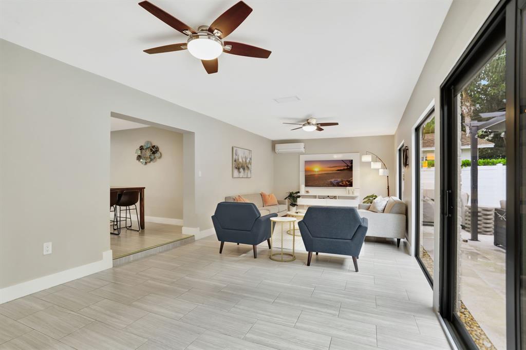 1035 Northwest 5th Avenue Boca Raton, FL 33432 - Photo 20 of 50 a living room with furniture and a window