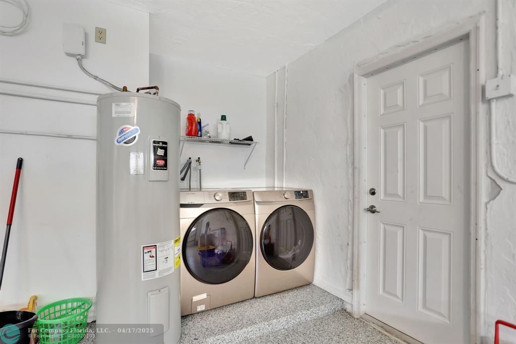 1035 Northwest 5th Avenue Boca Raton, FL 33432 - Photo 50 of 50 a utility room with dryer and washer