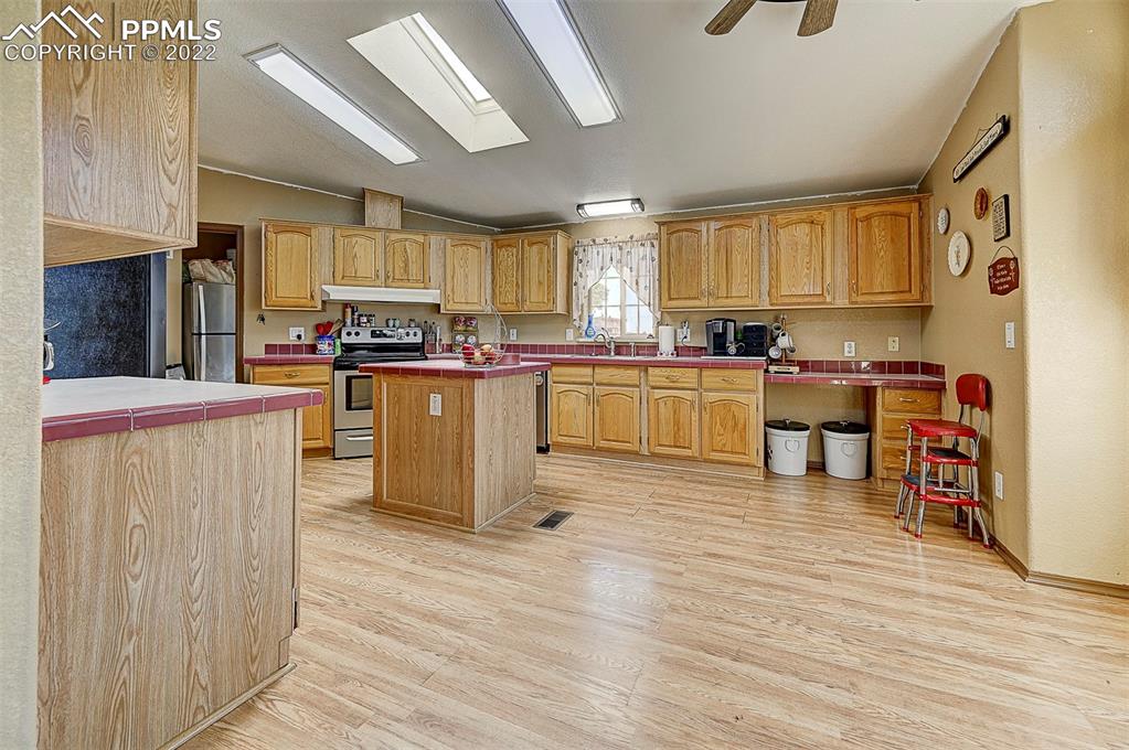 44560 Highway 50 Avondale, CO 81022 - Photo 13 of 50 a kitchen with lots of counter top space and appliances