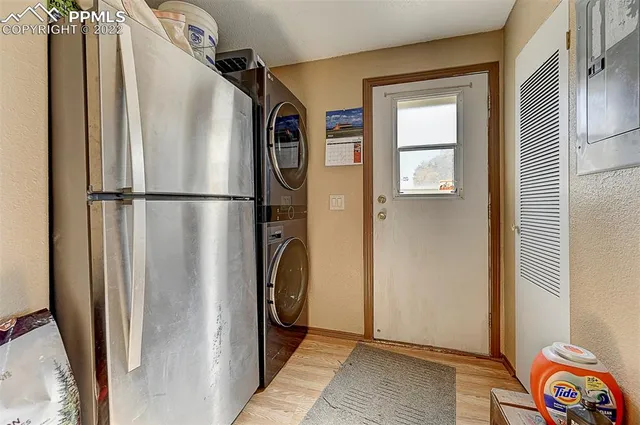 a utility room with windows