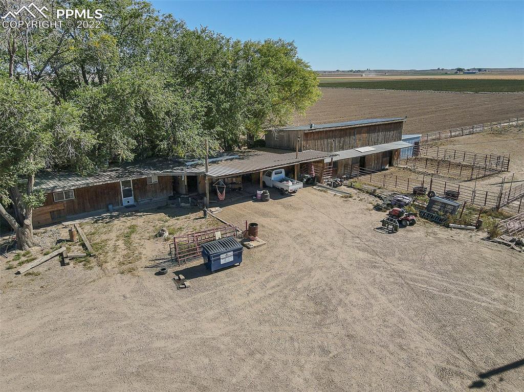 44560 Highway 50 Avondale, CO 81022 - Photo 29 of 50 a view of backyard with a table and chairs under an umbrella
