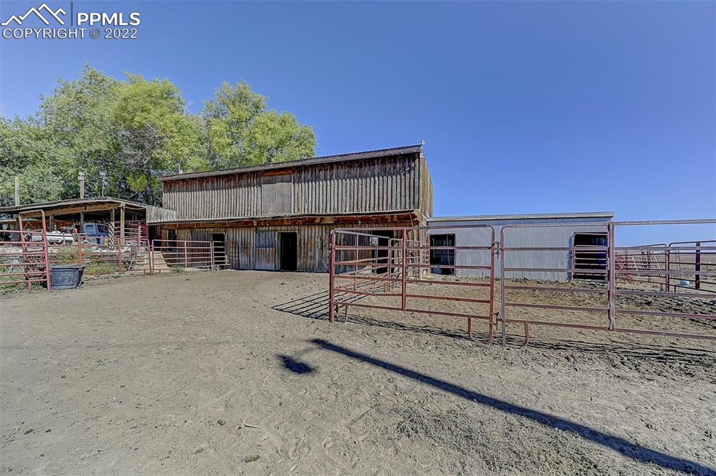 44560 Highway 50 Avondale, CO 81022 - Photo 35 of 50 a view of a house with a backyard and seating space