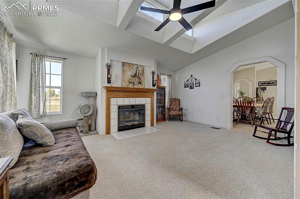 44560 Highway 50 Avondale, CO 81022 - Photo 10 of 50 a bed room with furniture and a fireplace