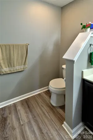 a bathroom with a toilet and a sink