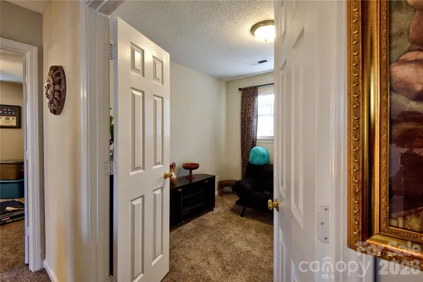 a view of a livingroom with furniture and windows