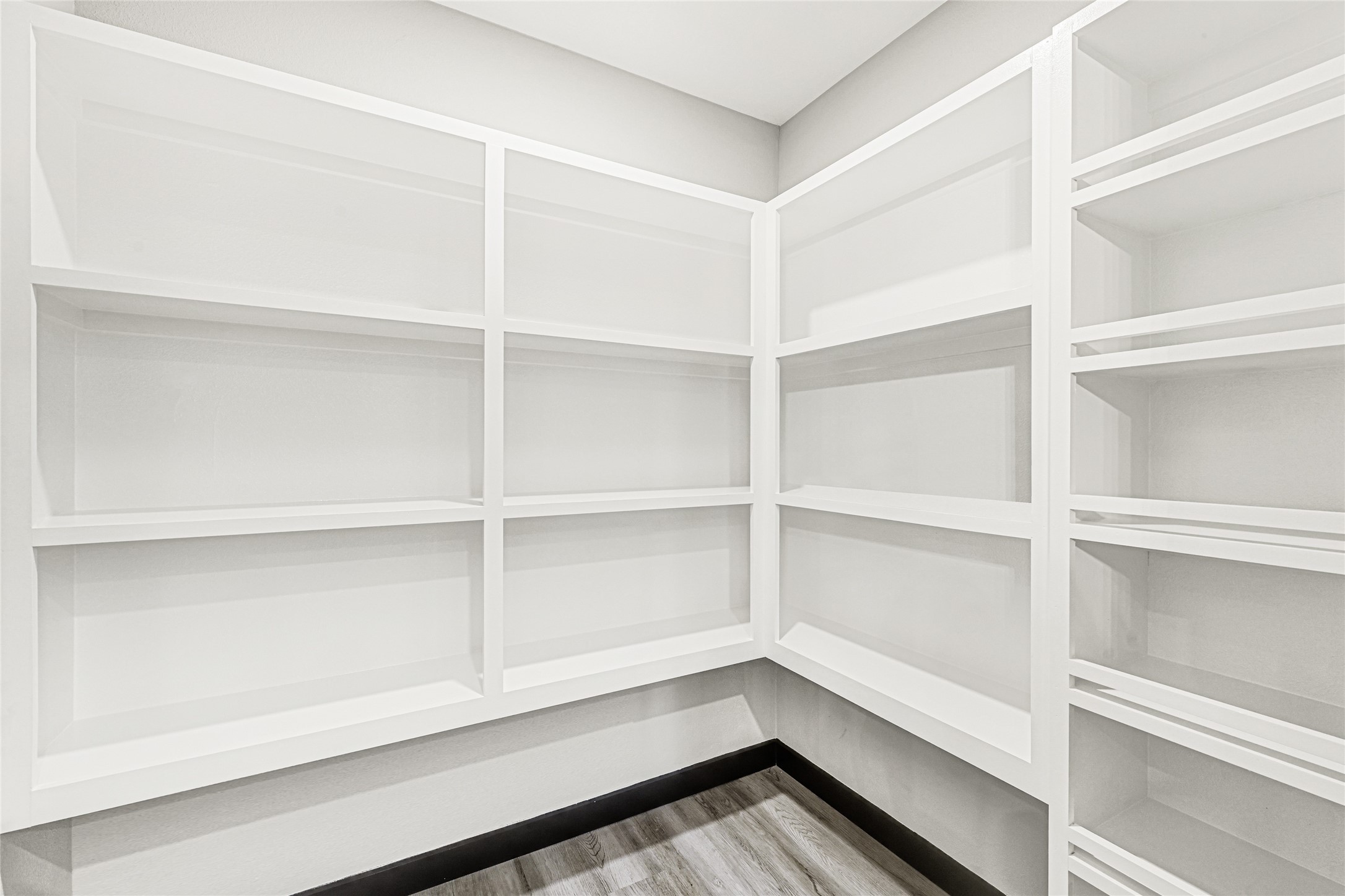 16240 2nd Street Rosharon, TX 77583 - Photo 12 of 26 a view of walk in closet with empty racks