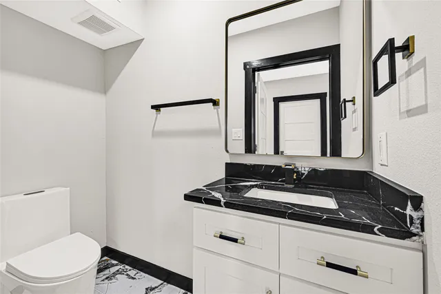 a living room with a fireplace and a window