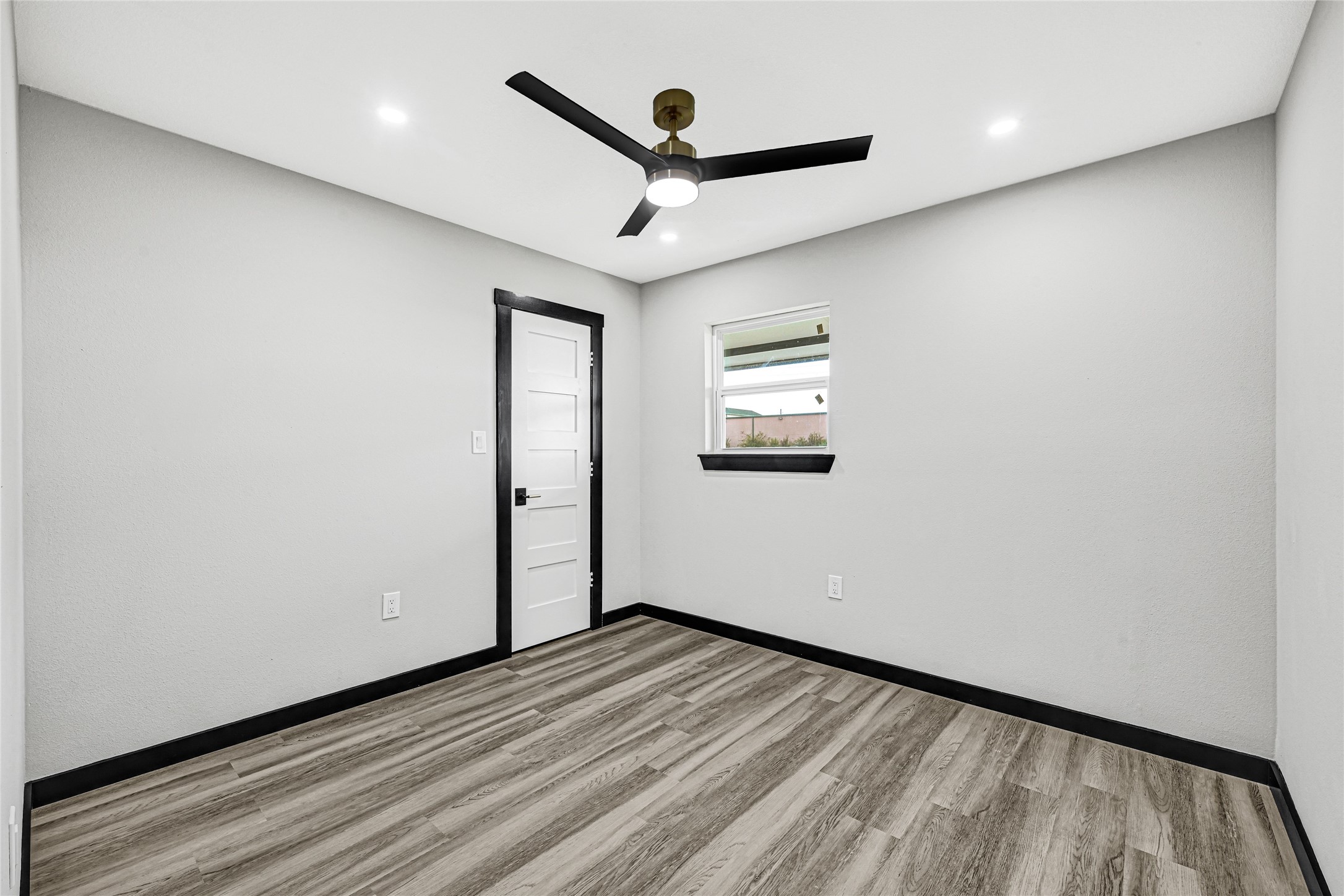 16240 2nd Street Rosharon, TX 77583 - Photo 23 of 26 a view of empty room with wooden floor