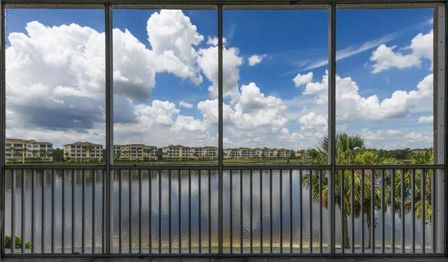a view of a swimming pool and a chair