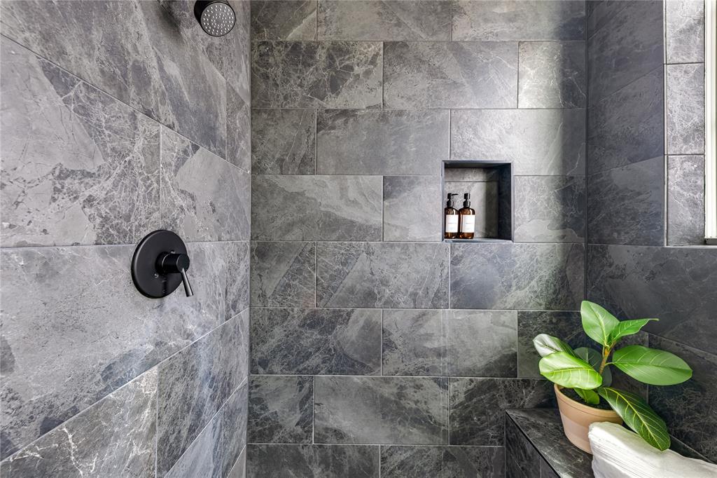 13325 Bee Street, Unit 302 Farmers Branch, TX 75234 - Photo 16 of 23 a bathroom with a toilet and a shower